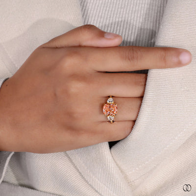 Orange Cushion Cut Ring With Side Trillion Stone
