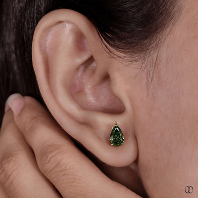 Designer earrings with refined craftsmanship and elegant diamond settings
