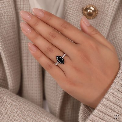 Dutch marquise engagement ring with sparkling accent stones
