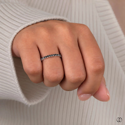 Stacking band with delicate stones for a stylish layered look
