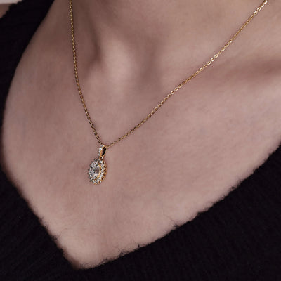 Unique design pendant with distinctive details and elegant styling
