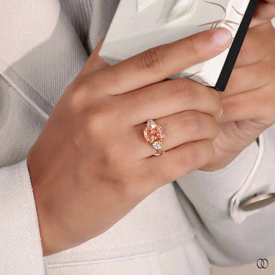 Orange Cushion Cut Ring With Side Trillion Stone