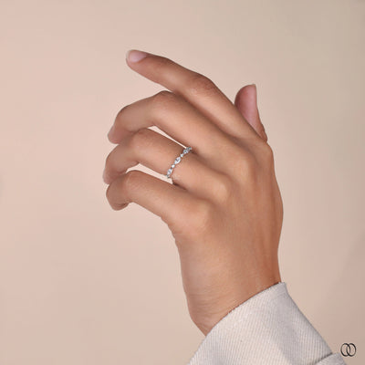 shared prong setting white gold wedding band
