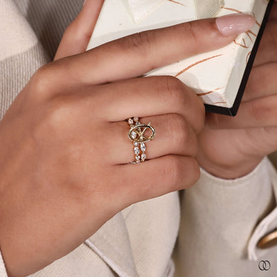 Half eternity band with diamonds across half the ring

