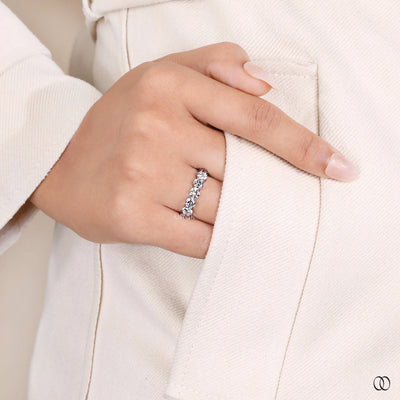 shared prong seven stone eternity band
