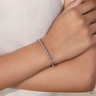oval diamond bracelet shared prong tennis band
