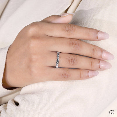 white gold ring shared prong eternity band
