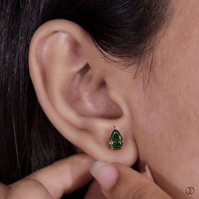 Handmade earrings with delicate craftsmanship and sparkling gemstones
