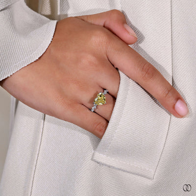 yellow diamond heart side stone ring
