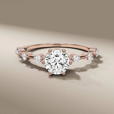 yellow gold ring featuring round cut lab grown diamond
