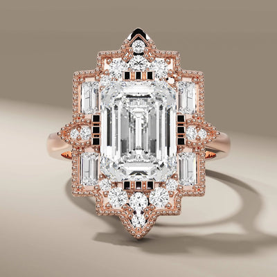 unique design emerald ring accented with round cut diamonds
