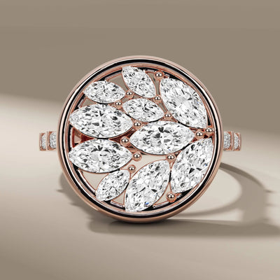 cocktail diamond ring with cluster marquise center stones
