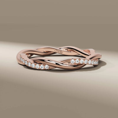 lab grown round cut twisted wedding band in gold
