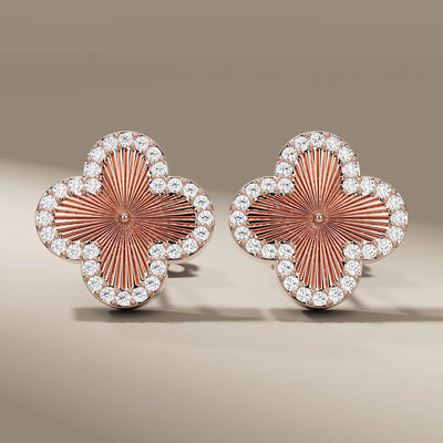 Unique clover diamond stud earrings in yellow gold setting

