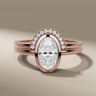 c shape wedding band styled with oval cut diamond engagement
