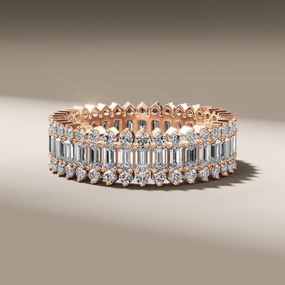 designer baguette and round diamond band in yellow gold
