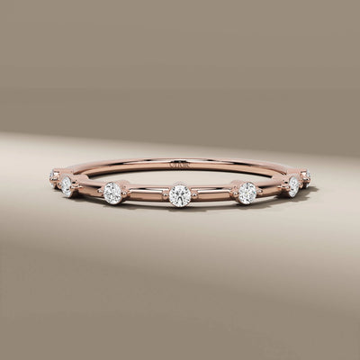 distance pave round diamond minimalist wedding band
