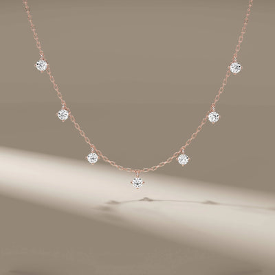 Unique design pendant with round lab diamonds in gold
