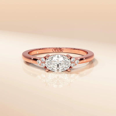 Handmade oval moissanite ring with side diamonds

