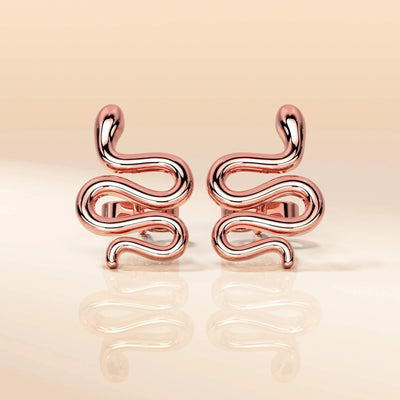 designer stud earrings in unique snake-inspired style
