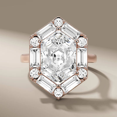 yellow gold hexagon engagement ring with halo detailing
