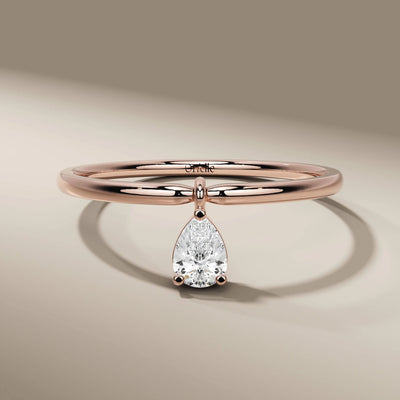 handmade pear cut diamond ring with modern bezel design
