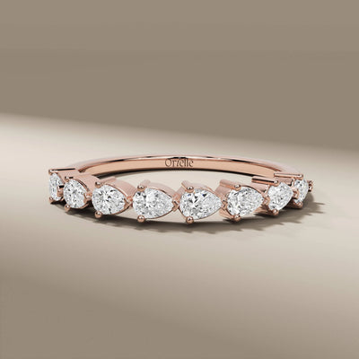 unique pear cut shared prong minimalist wedding band
