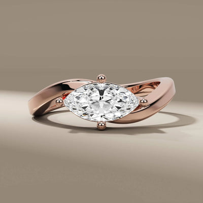 bypass setting ring with east west marquise diamond design
