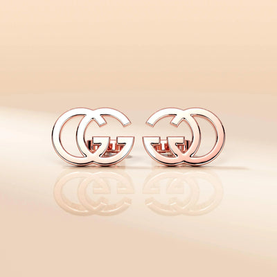 handmade double g earrings with unique crafted detail
