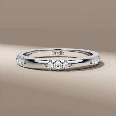 Unique design round wedding band in polished yellow gold
