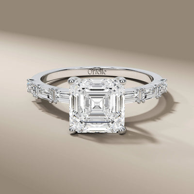 handmade ring with baguette and pave diamond accents
