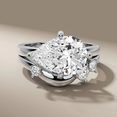 lab grown diamond bridal set with pear cut solitaire ring
