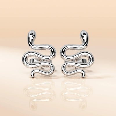 handmade snake earrings crafted in fine yellow gold
