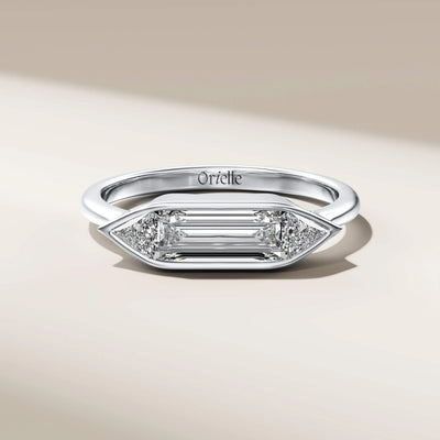 lab grown diamond ring with baguette center and trilliant sides
