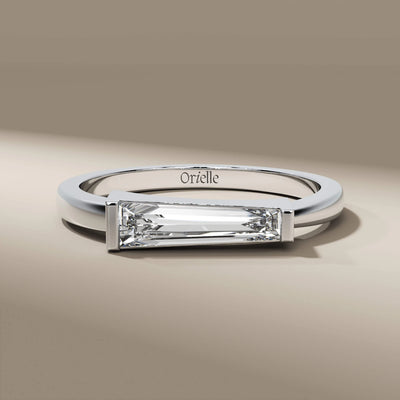 unique design ring featuring east west bar set diamond
