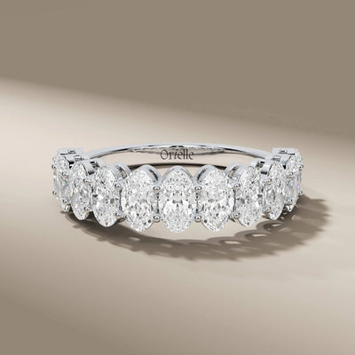 yellow gold oval diamond band with half eternity design

