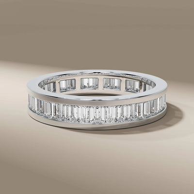 designer wedding band with full eternity baguette layout
