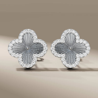 Gold stud earrings for women with round cut lab grown diamonds
