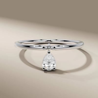 designer pear cut ring in yellow gold with unique details
