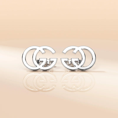 iconic interlocking earrings in polished yellow gold
