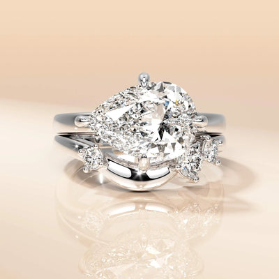 Unique Pear Cut Engagement Ring with Curved Moissanite Bridal Set

