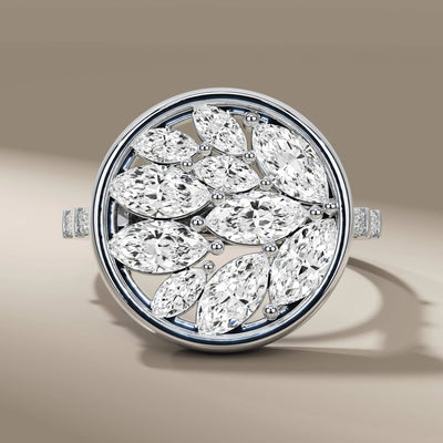 side baguette diamond ring paired with marquise cluster design
