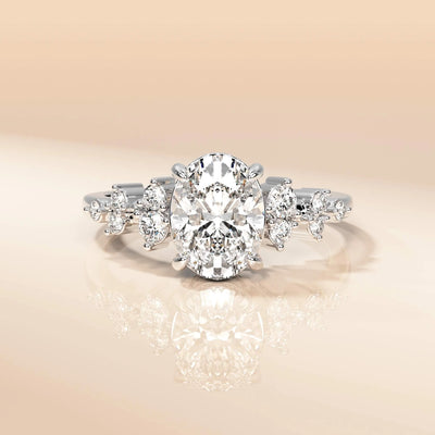 Oval cut engagement ring in yellow gold with claw prong design
