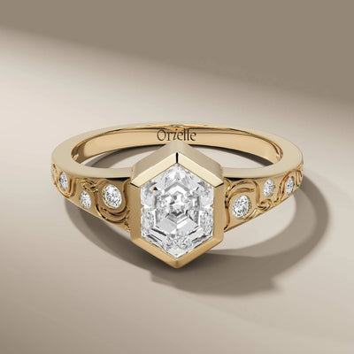 hexagon engagement ring in yellow gold with bezel set diamond

