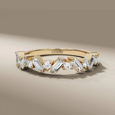 Half eternity wedding band with round and baguette diamonds in gold

