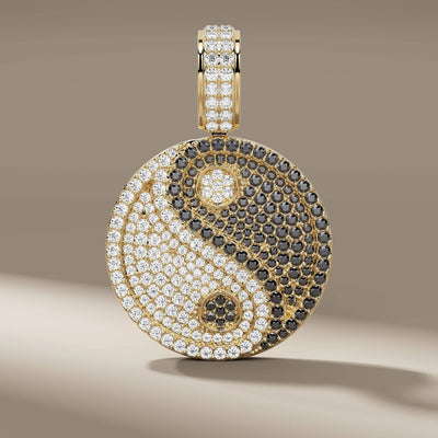 yin yang pendant with round diamonds in yellow gold
