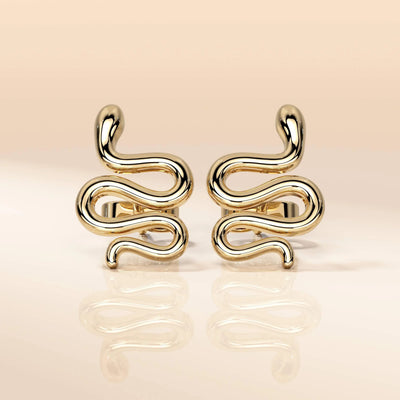 unique design earrings with sleek solid gold snake form
