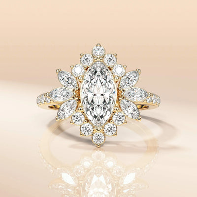 Marquise cut moissanite ring with elegant yellow gold band
