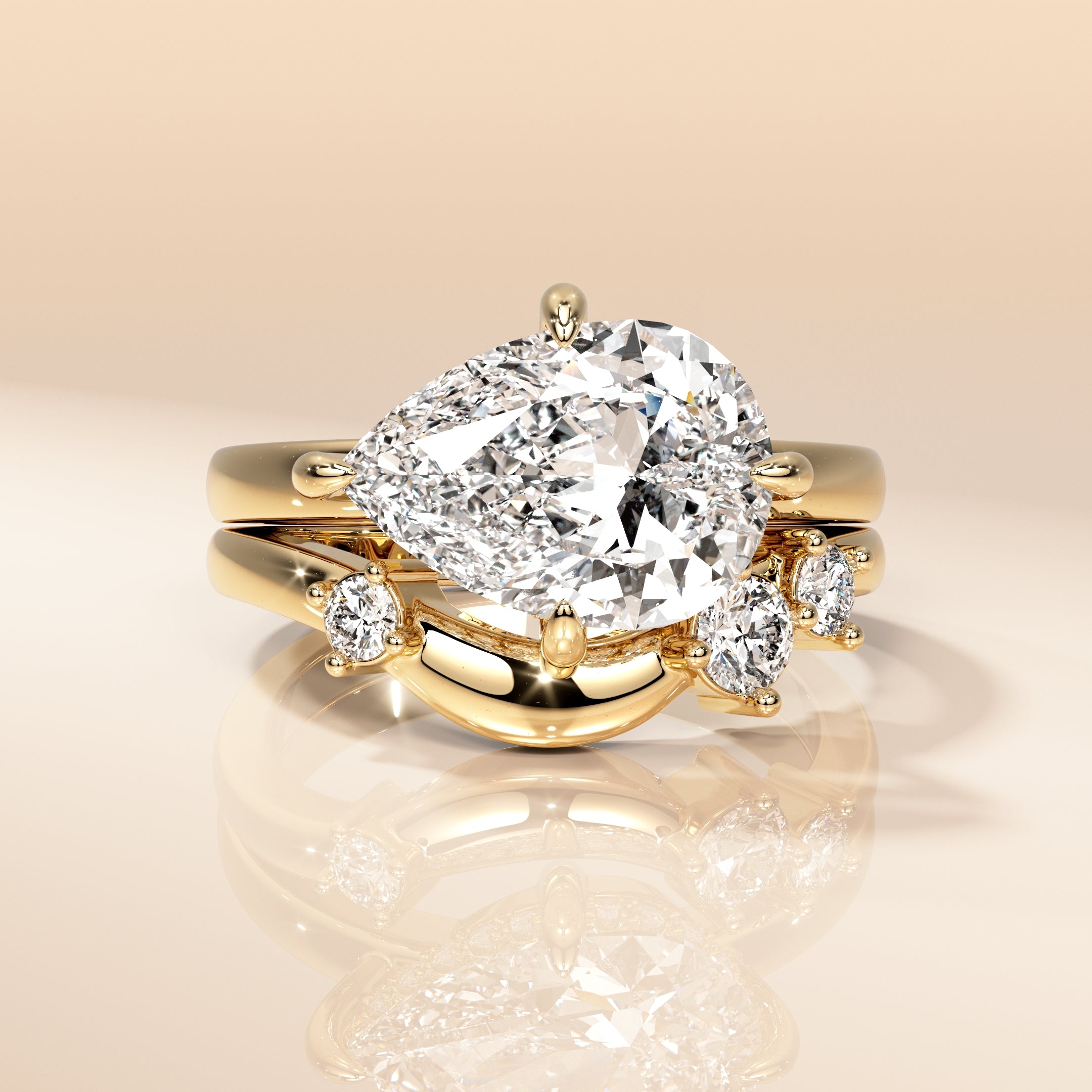 Regal Pear Cut Moissanite Bridal Duo With Luxe Gold Statement Engagement & Wedding Ring Set