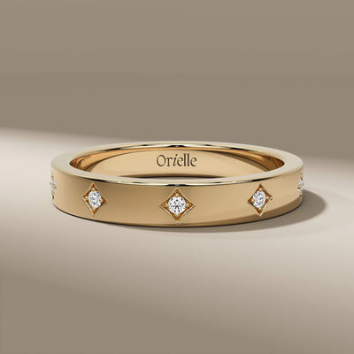 flush set wedding band in yellow gold with round diamonds
